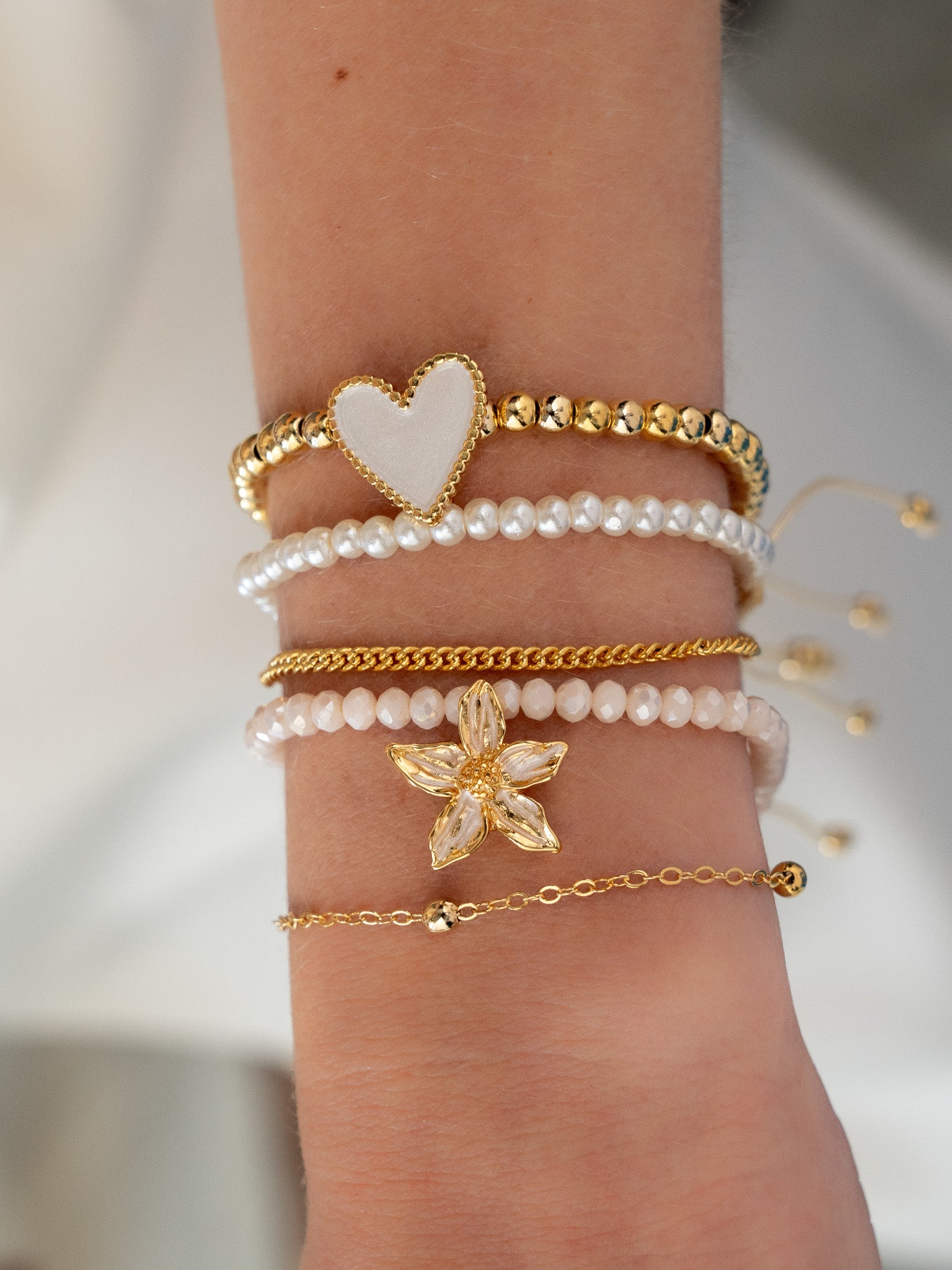 Set x5 Pulseras Flor + Aretes