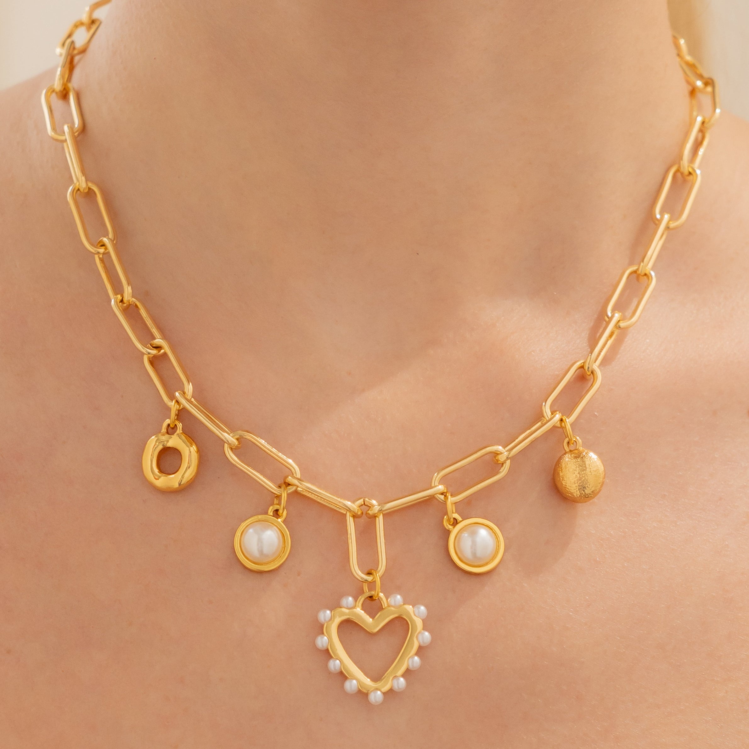Collar Multicharms Corazón Perla + Aretes